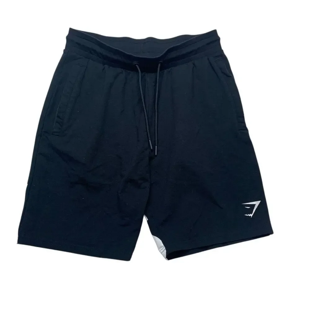 Gymshark Men's medium athletic Black Shorts with White Logo